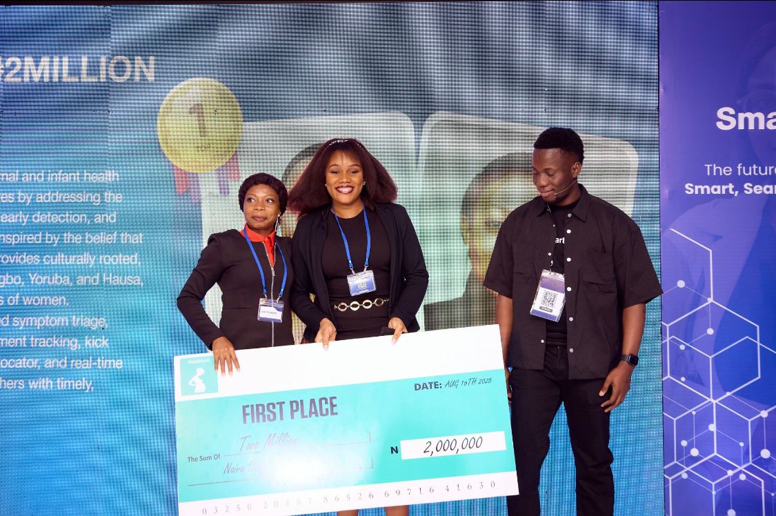 Francisca winning the HelpMum CareCode Hackathon